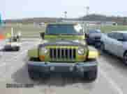 2007 Jeep Wrangler Unlimited Sahara z VIN 1J8GA59167L161894, wystawiony jako IAAI lot #41856064 z przebiegiem 122 714 mil mil oraz . Historia ofert i sprzedaży dostępna na DreamBid. Obrazek 13.