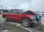 2010 Dodge Dakota Bighorn/Lonestar z VIN 1D7CE3GK3AS263831, wystawiony jako Copart lot #61444305 z przebiegiem 100 902 mil mil oraz Szkoda całkowita • Salvage title. Historia ofert i sprzedaży dostępna na DreamBid. Obrazek 4.