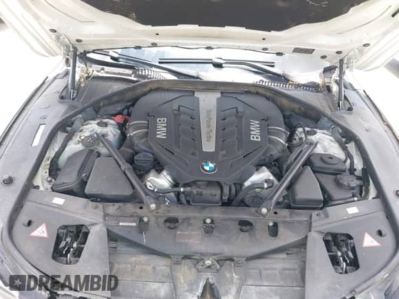 2012 BMW 7 Series 750Li z VIN WBAKB8C54CC964576, wystawiony jako IAAI lot #42499443 z przebiegiem 78 728 mil mil oraz . Historia ofert i sprzedaży dostępna na DreamBid. Obrazek 10.