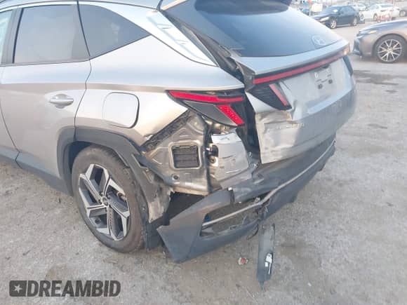 2022 Hyundai Tucson SEL Convenience with VIN KM8JFCA16NU016954, listed as a IAAI auction lot 43058837 with 122,572 mi miles and . Bid and sale history available at DreamBid. Image 6.