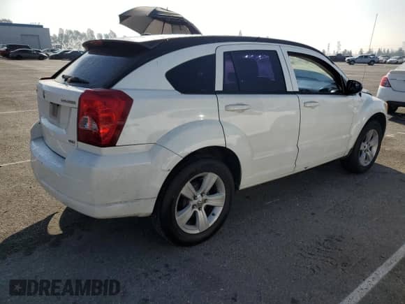 2010 Dodge Caliber SXT with VIN 1B3CB4HA3AD595658, listed as a Copart auction lot 85376495 with 209,626 mi miles and Salvage title. Bid and sale history available at DreamBid. Image 3.
