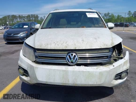 2015 Volkswagen Tiguan S with VIN WVGAV7AX4FW506314, listed as a IAAI auction lot 42063584 with 143,939 mi miles and . Bid and sale history available at DreamBid. Image 13.