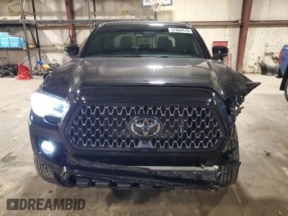 2021 Toyota Tacoma Limited with VIN 3TMGZ5ANXMM430133, listed as a Copart auction lot 57884415 with 36,650 mi miles and Salvage title. Bid and sale history available at DreamBid. Image 5.