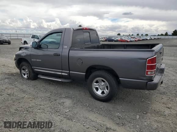 2002 Dodge 1500 z VIN 1D7HU16N92J142544, wystawiony jako Copart lot #68141755 z przebiegiem 128 702 mil mil oraz Szkoda całkowita • Salvage title. Historia ofert i sprzedaży dostępna na DreamBid. Obrazek 2.