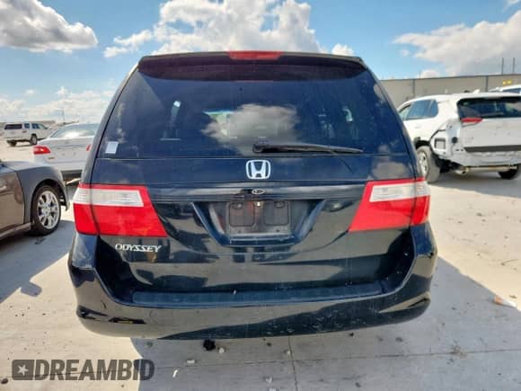 2007 Honda Odyssey EX-L z VIN 5FNRL38627B056882, wystawiony jako Copart lot #82173585 z przebiegiem 214 207 mil mil oraz Szkoda całkowita • Salvage title. Historia ofert i sprzedaży dostępna na DreamBid. Obrazek 6.