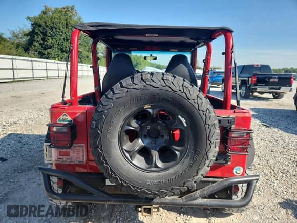 1999 Jeep Wrangler Sport с VIN 1J4FY19S8XP458426, выставлен на аукционе Copart как лот 71040775 с пробегом 256 600 миль миль и Чистый • Clean title. История ставок и продаж доступна на DreamBid. Изображение 6.