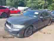 2021 BMW 5 Series 530i xDrive with VIN WBA13BJ03MWX21760, listed as a IAAI auction lot 42833981 with 77,077 mi miles and . Bid and sale history available at DreamBid. Image 2.