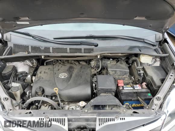 2020 Toyota Sienna XLE z VIN 5TDDZ3DC3LS243509, wystawiony jako Copart lot #69096265 z przebiegiem 63 477 mil mil oraz Szkoda całkowita • Salvage title. Historia ofert i sprzedaży dostępna na DreamBid. Obrazek 12.