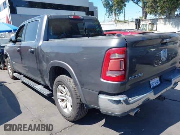 2019 Ram 1500 Laramie with VIN 1C6RREJT9KN616036, listed as a IAAI auction lot 42670299 with 74,819 mi miles and . Bid and sale history available at DreamBid. Image 3.