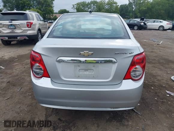 2012 Chevrolet Sonic LT with VIN 1G1JC5SH7C4103420, listed as a IAAI auction lot 43106787 with 72,914 mi miles and . Bid and sale history available at DreamBid. Image 16.