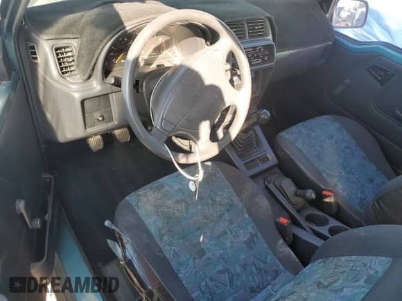 1996 Chevrolet Tracker с VIN 2CNBJ1869T6903615, выставлен на аукционе Copart как лот 49690055 с пробегом 144 821 миль миль и Списание • Salvage title. История ставок и продаж доступна на DreamBid. Изображение 8.