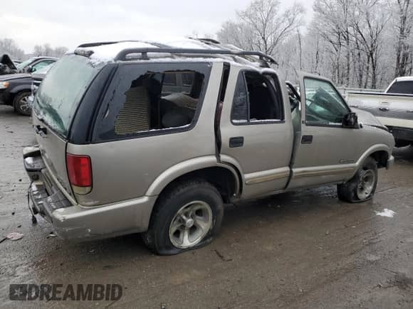 2003 Chevrolet Blazer LS с VIN 1GNCS13X63K129026, выставлен на аукционе Copart как лот 84567954 с пробегом Не указан миль и Списание • Salvage title. История ставок и продаж доступна на DreamBid. Изображение 3.