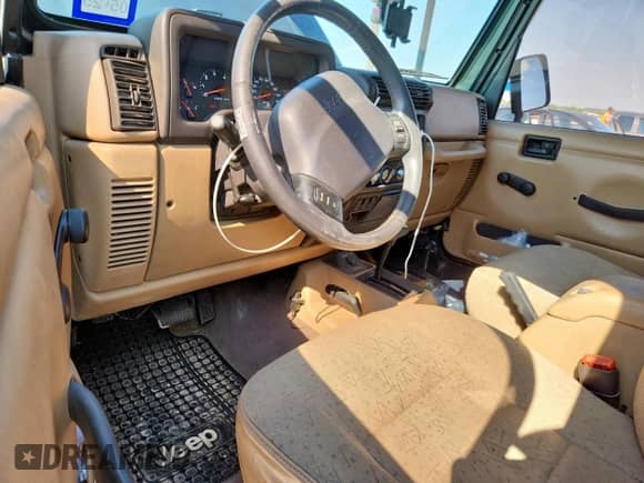 2002 Jeep Wrangler Sport with VIN 1J4FA49S82P730326, listed as a Copart auction lot 70413695 with 148,258 mi miles and Salvage title. Bid and sale history available at DreamBid. Image 8.