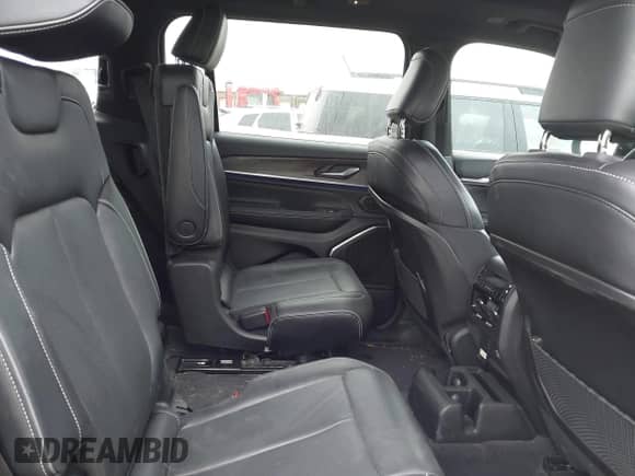 2023 Jeep Grand Cherokee Overland with VIN 1C4RJKDT9P8107466, listed as a IAAI auction lot 41428743 with 34,317 mi miles and . Bid and sale history available at DreamBid. Image 8.