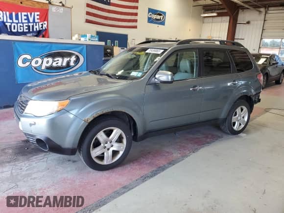 2009 Subaru Forester X with VIN JF2SH63659H753866, listed as a Copart auction lot 70499865 with 138,003 mi miles and Salvage title. Bid and sale history available at DreamBid. Image 1.