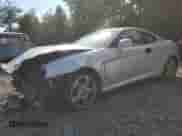 2006 Hyundai Tiburon GT с VIN KMHHN65F76U229244, выставлен на аукционе Copart как лот 71157904 с пробегом 228 575 миль миль и Списание • Salvage title. История ставок и продаж доступна на DreamBid. Изображение 1.