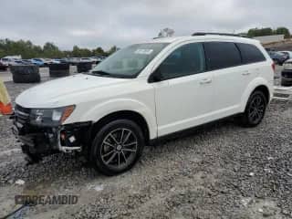 2017 Dodge Journey SE with VIN 3C4PDCAB8HT622011, listed as a Copart auction lot 85518895 with 121,368 mi miles and Salvage title. Bid and sale history available at DreamBid. Image 1.
