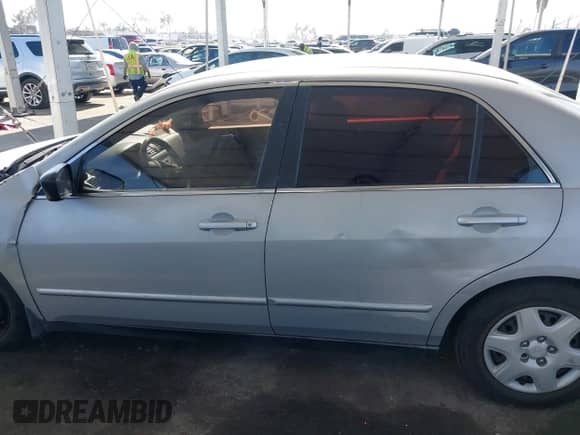 2003 Honda Accord LX with VIN 1HGCM56463A045842, listed as a IAAI auction lot 42104299 with Not provided miles and . Bid and sale history available at DreamBid. Image 14.