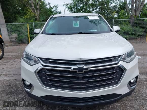 2018 Chevrolet Traverse LT z VIN 1GNERHKW6JJ149950, wystawiony jako IAAI lot #43249063 z przebiegiem 104 795 mil mil oraz . Historia ofert i sprzedaży dostępna na DreamBid. Obrazek 12.