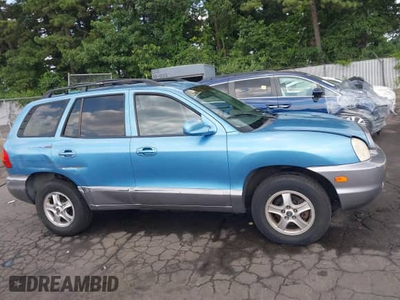 2004 Hyundai Santa Fe GLS with VIN KM8SC13D84U693236, listed as a IAAI auction lot 42789294 with 137,630 mi miles and . Bid and sale history available at DreamBid. Image 14.