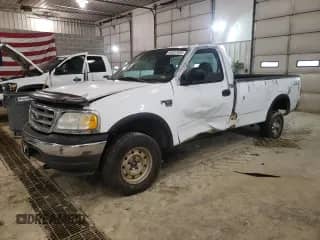 2002 Ford F-150 XL z VIN 1FTRF18W72KB04366, wystawiony jako Copart lot #54933503 z przebiegiem 182 593 mil mil oraz Nie do naprawy • Non repairable. Historia ofert i sprzedaży dostępna na DreamBid. Obrazek 1.