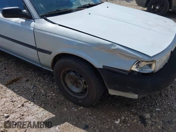 1990 Toyota Camry z VIN JT2SV21WXL0343081, wystawiony jako IAAI lot #42665207 z przebiegiem 212 900 mil mil oraz . Historia ofert i sprzedaży dostępna na DreamBid. Obrazek 17.
