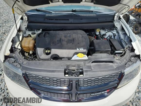 2019 Dodge Journey Crossroad z VIN 3C4PDCGG8KT700555, wystawiony jako Copart lot #63570015 z przebiegiem 94 791 mil mil oraz Czysty tytuł • Clean title. Historia ofert i sprzedaży dostępna na DreamBid. Obrazek 12.