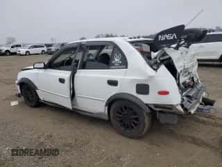 2002 Hyundai Accent GL с VIN KMHCG45C92U271388, выставлен на аукционе Copart как лот 85925124 с пробегом 98 390 миль миль и Списание • Salvage title. История ставок и продаж доступна на DreamBid. Изображение 2.