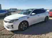 2018 Kia Optima LX с VIN 5XXGT4L36JG251317, выставлен на аукционе Copart как лот 86491225 с пробегом 90 940 миль миль и Списание • Salvage title. История ставок и продаж доступна на DreamBid. Изображение 1.