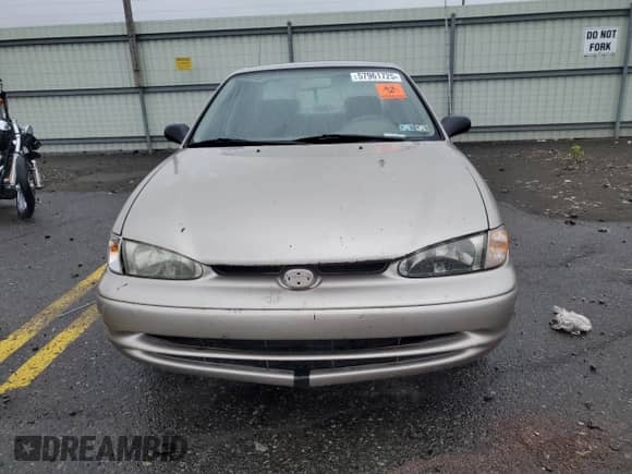 1999 Chevrolet Prizm z VIN 1Y1SK5284XZ403676, wystawiony jako Copart lot #57961725 z przebiegiem Nie podano mil oraz Szkoda całkowita • Salvage title. Historia ofert i sprzedaży dostępna na DreamBid. Obrazek 5.