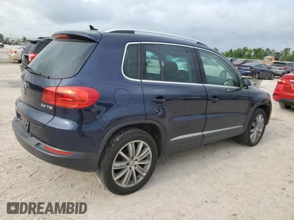 2013 Volkswagen Tiguan SE z VIN WVGAV3AX9DW056696, wystawiony jako Copart lot #54721695 z przebiegiem 108 656 mil mil oraz Szkoda całkowita • Salvage title. Historia ofert i sprzedaży dostępna na DreamBid. Obrazek 3.