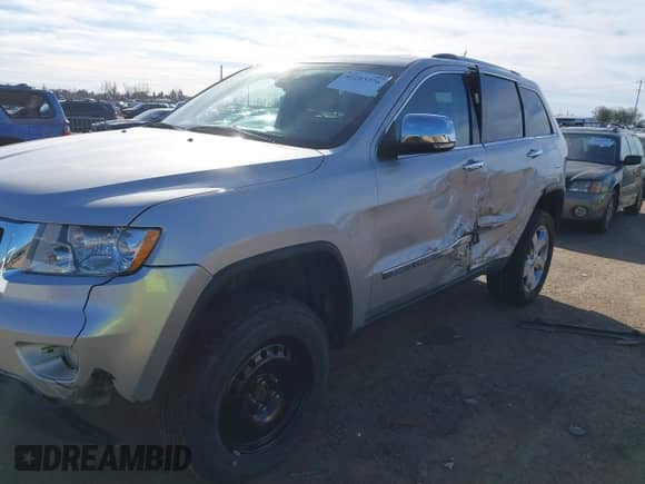 2012 Jeep Grand Cherokee Overland с VIN 1C4RJFCTXCC201422, выставлен на аукционе IAAI как лот 41283376 с пробегом 93 736 миль миль и . История ставок и продаж доступна на DreamBid. Изображение 6.