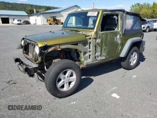 2008 Jeep Wrangler X z VIN 1J4FA24168L525400, wystawiony jako Copart lot #80185905 z przebiegiem 72 640 mil mil oraz Szkoda całkowita • Salvage title. Historia ofert i sprzedaży dostępna na DreamBid. Obrazek 1.