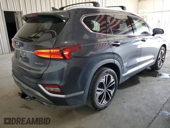 2020 Hyundai Santa Fe SEL with VIN 5NMS3CAA9LH293202, listed as a Copart auction lot 72715452 with 33,881 mi miles and . Bid and sale history available at DreamBid. Image 3.
