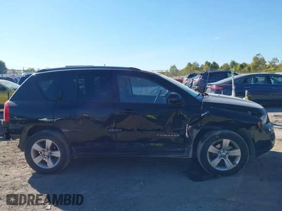2014 Jeep Compass Latitude with VIN 1C4NJDEB8ED661117, listed as a IAAI auction lot 43368488 with 74,122 mi miles and . Bid and sale history available at DreamBid. Image 14.