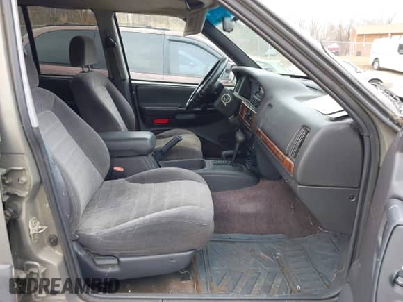 1996 Jeep Grand Cherokee with VIN 1J4EZ58S1TC112995, listed as a IAAI auction lot 41706966 with 356,727 mi miles and . Bid and sale history available at DreamBid. Image 5.