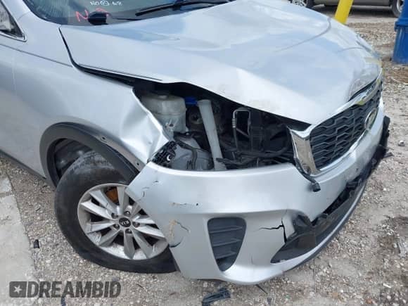 2019 Kia Sorento LX with VIN 5XYPG4A3XKG577478, listed as a IAAI auction lot 42248745 with 142,153 mi miles and . Bid and sale history available at DreamBid. Image 16.