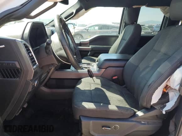 2016 Ford F-150 XLT with VIN 1FTFX1EG4GKF49765, listed as a Copart auction lot 54709385 with 126,054 mi miles and Salvage title. Bid and sale history available at DreamBid. Image 7.