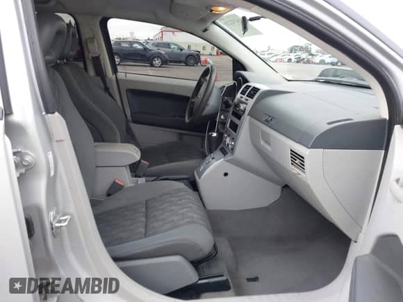2007 Dodge Caliber SXT z VIN 1B3HB48B37D528162, wystawiony jako IAAI lot #43432220 z przebiegiem 95 469 mil mil oraz . Historia ofert i sprzedaży dostępna na DreamBid. Obrazek 5.
