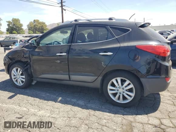 2013 Hyundai Tucson Limited с VIN KM8JU3AC1DU763710, выставлен на аукционе Copart как лот 69804785 с пробегом 189 772 миль миль и Списание • Salvage title. История ставок и продаж доступна на DreamBid. Изображение 2.