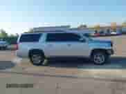 2020 Chevrolet Suburban LT with VIN 1GNSKHKC6LR304885, listed as a IAAI auction lot 43213423 with 179,235 mi miles and . Bid and sale history available at DreamBid. Image 13.