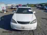 2002 Toyota Camry LE z VIN JTDBE32K820050500, wystawiony jako IAAI lot #42443589 z przebiegiem 262 287 mil mil oraz . Historia ofert i sprzedaży dostępna na DreamBid. Obrazek 12.