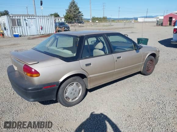 1995 Saturn SL с VIN 1G8ZG528XSZ264242, выставлен на аукционе IAAI как лот 42883470 с пробегом 141 027 миль миль и . История ставок и продаж доступна на DreamBid. Изображение 4.