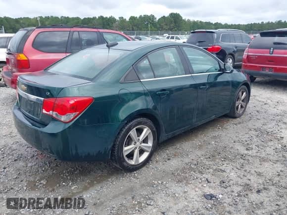 2015 Chevrolet Cruze LT with VIN 1G1PE5SBXF7264587, listed as a IAAI auction lot 43326299 with 192,973 mi miles and . Bid and sale history available at DreamBid. Image 4.
