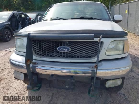 2000 Ford F-150 XL z VIN 1FTZF1828YNA84245, wystawiony jako IAAI lot #43340021 z przebiegiem Nie podano mil oraz . Historia ofert i sprzedaży dostępna na DreamBid. Obrazek 12.