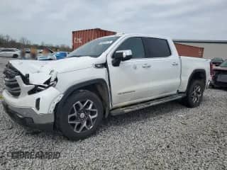 2024 GMC Sierra 1500 SLT z VIN 3GTUUDE89RG147700, wystawiony jako Copart lot #50094175 z przebiegiem 12 206 mil mil oraz Szkoda całkowita • Salvage title. Historia ofert i sprzedaży dostępna na DreamBid. Obrazek 1.