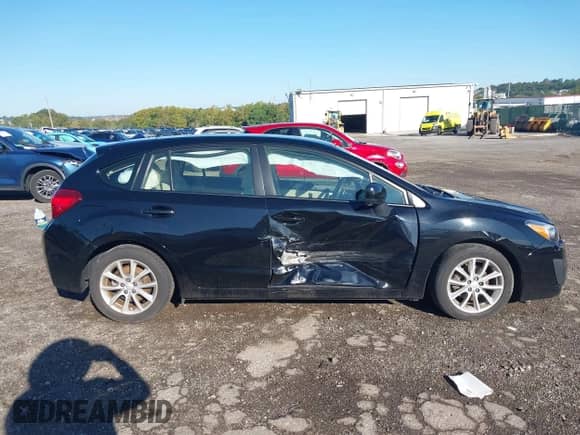 2014 Subaru Impreza Premium with VIN JF1GPAC67E8220878, listed as a IAAI auction lot 43161953 with 28,515 mi miles and . Bid and sale history available at DreamBid. Image 13.