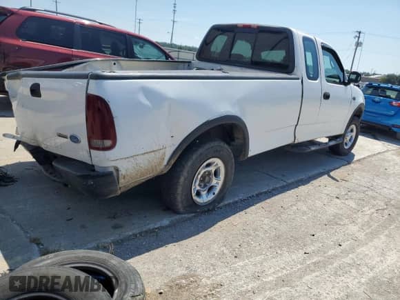 2000 Ford F-150 XL with VIN 1FTRX18L9YNB88412, listed as a Copart auction lot 69318865 with Not provided miles and Non repairable. Bid and sale history available at DreamBid. Image 3.