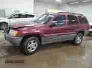 2002 Jeep Grand Cherokee Sport with VIN 1J4GW38S52C272382, listed as a Copart auction lot 65164915 with 248,964 mi miles and Clean title. Bid and sale history available at DreamBid. Image 1.