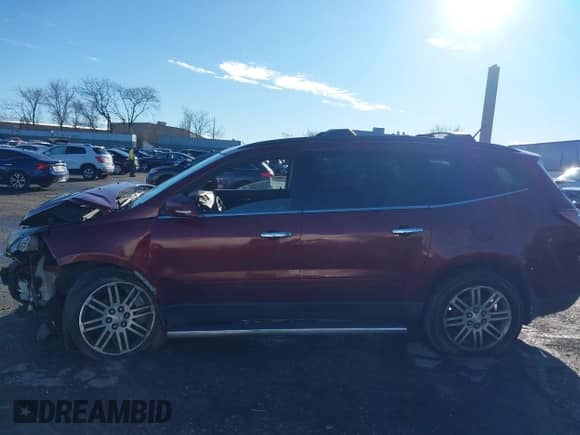 2015 Chevrolet Traverse LT with VIN 1GNKRGKD5FJ101424, listed as a IAAI auction lot 41211081 with 130,639 mi miles and . Bid and sale history available at DreamBid. Image 15.